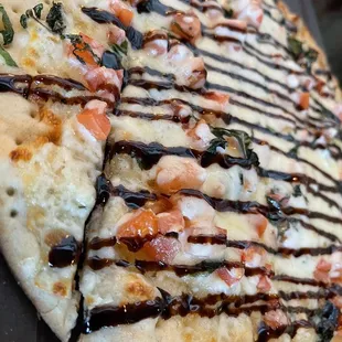  close up of a flatbread pizza
