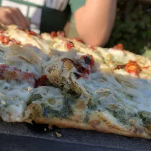 a close up of a pizza