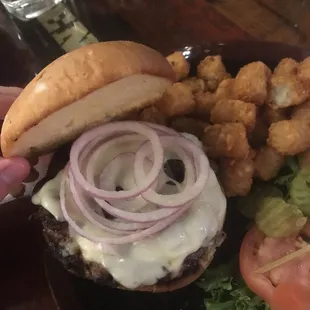 Mushroom and Swiss Burger with a side of tater tots (lettuce and tomato on the side)
