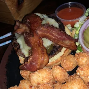 a burger and tater tots