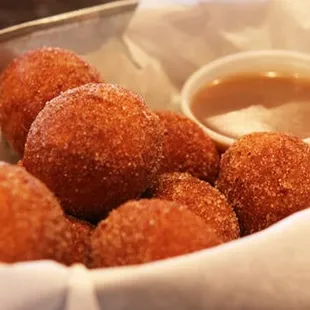 a basket of fried doughnuts