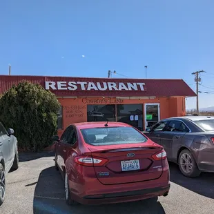 Full name is hard to see, but look for little Adobe colored building right off freeway.