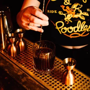 a bartender making a drink