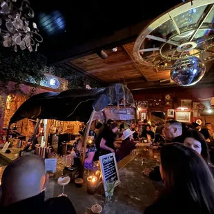 a crowd of people at a bar