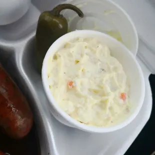 hot dogs, mashed potatoes, and pickles