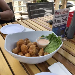 Homemade cheese curds and a ranch-sriracha dipping sauce. Very good!