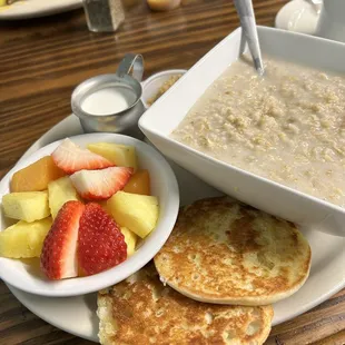 Oatmeal, brown sugar &amp; milk with fresh fruit and toasted English muffin.