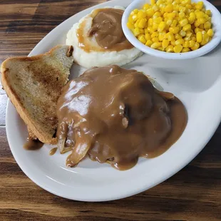 Chuck steak, mashed potato and corn