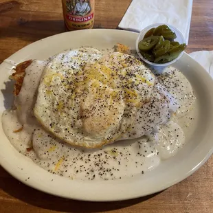 The "J.J"  open biscuit w/hash browns, 2 eggs, cream gravy and jalepeno's