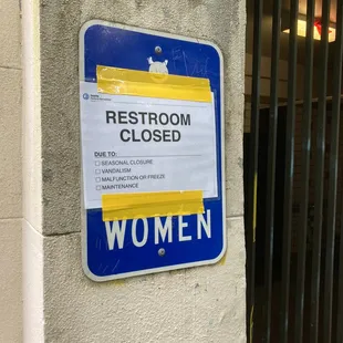 a restroom closed sign