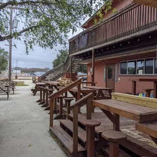 Walk to the left of a restaurant to the back stairwell.