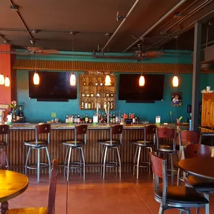 a man standing at a bar