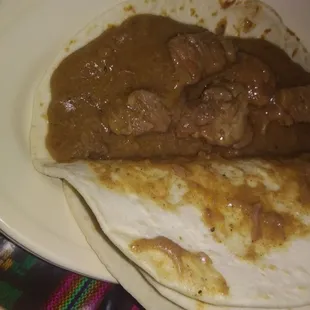 Carne guisada taco on homemade flour tortillas