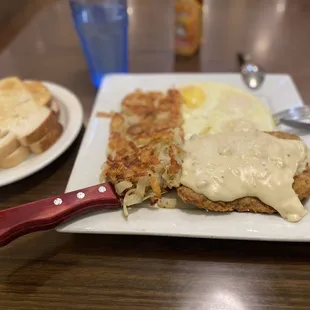 Country-fried steak with sausage gravy