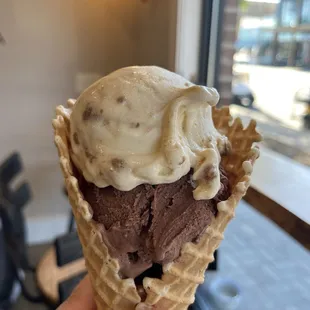 Caramel cookie butter and chocolate in a waffle cone