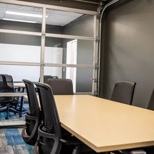 Large Conference Room looking into Small Conference Room.
Garage Style Door Opens to create Extended Conference Room