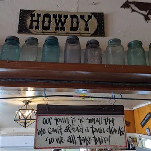 a sign above the counter