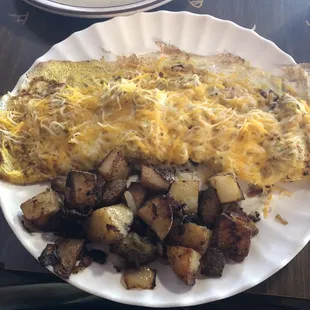 Linguica omelet and country fried potatoes