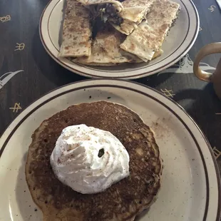 German Chocolate Chip pancakes with a Breakfast Quesadilla (bacon, cheese, egg, sausage)