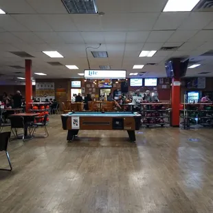 Fairly large in there with wooden floors.