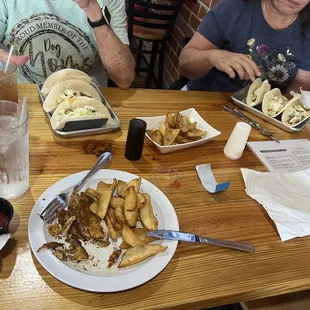 Blackened fish, bang bang shrimp tacos, hot honey tacos