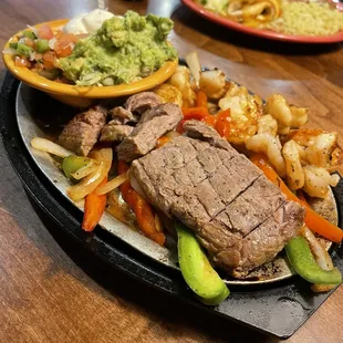 a plate of steak and vegetables