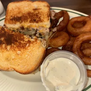 Tuna melt with grilled onions, mushrooms, and a side of onion rings
