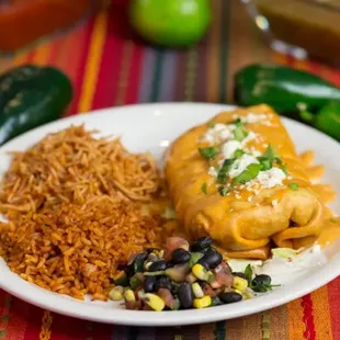 CHIMICHANGA! crispy flour shells filled with cheese, choice of meat &amp; sauce, served with one side add guacamole &amp; sour cream