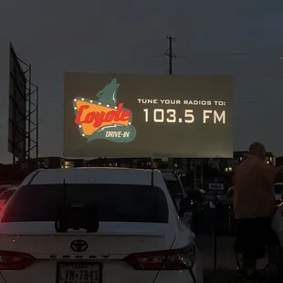 a large screen displaying the time