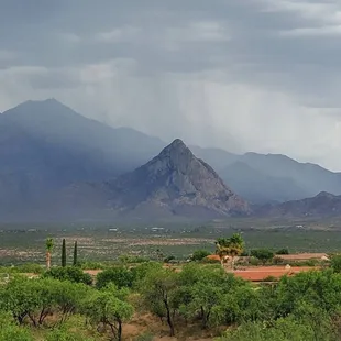 A view from the restaurant as a rainstorm hits Elephant Head in the Santa Rita Mtns.