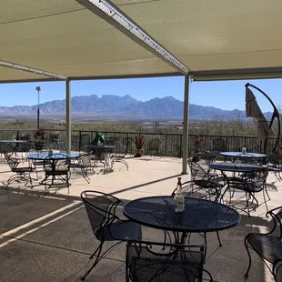 patio with tables and chairs