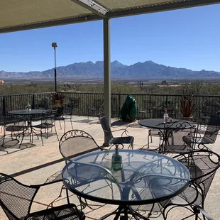 patio with tables and chairs