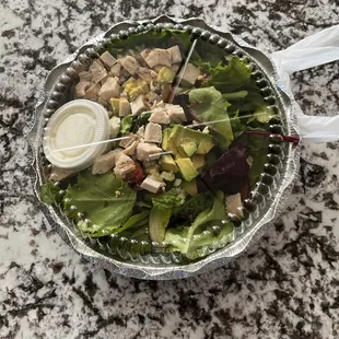 Cobb salad. No bacon, ham , hard boiled egg. Coyote Grill.
