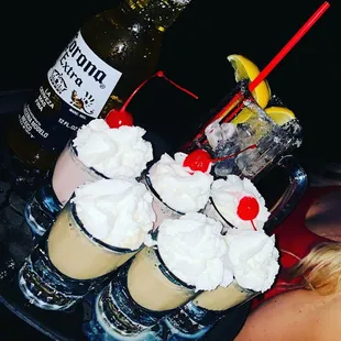 a tray of ice cream sundaes