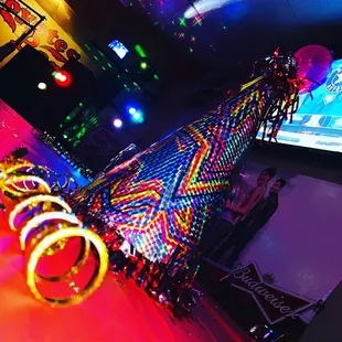 a neon - colored bar with neon lights