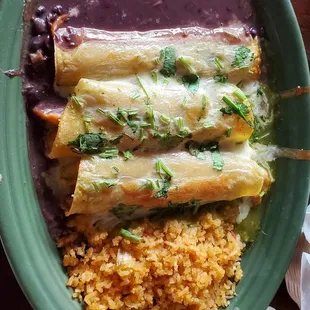 Grouper enchiladas, beans, rice