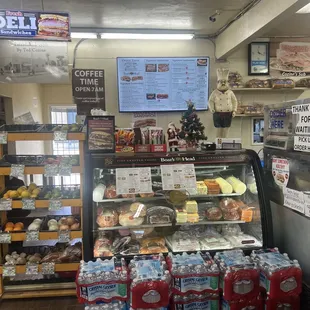 a display of liquor and deli items