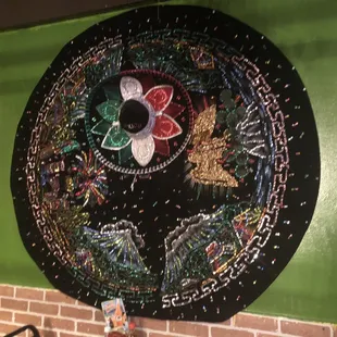 There are these amazing dresses hanging on the walls - there's probably about 10 or 12 them around the restaurant