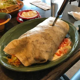 Grande Burrito!  Excellent and enough for another meal tomorrow.  Love this place.  Never a bad meal or service.