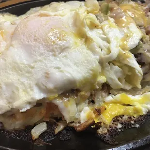 Country hash with eggs over easy on top