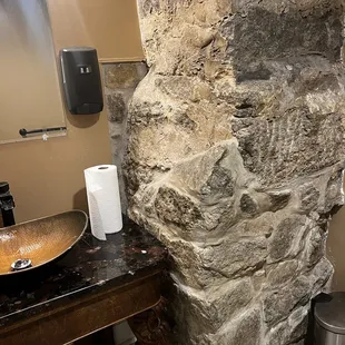 Exposed stone wall in the bathroom!