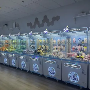 One side of the wall of claw machines