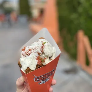 Corn fritters $7.49 , cone #5 .. has crème and pico on top