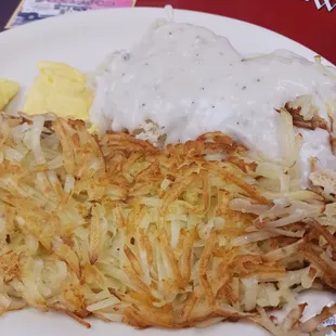 Biscuits and gravy,  scrambled eggs,  and hashbrowns.