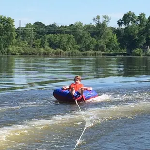 Tubing behind the rented pontoon!