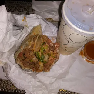 You can see from the half eaten burrito how big it was and how dull of all the good stuff