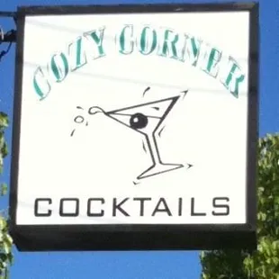 a sign for a cocktail bar