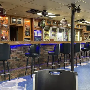 a bar with stools