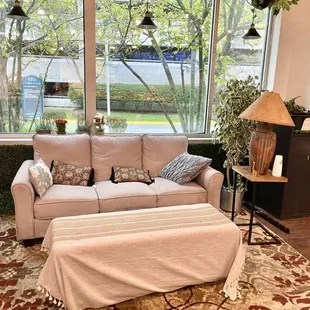 a living room with a couch and a coffee table