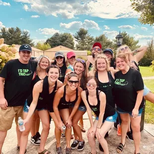 a group of people posing for a picture